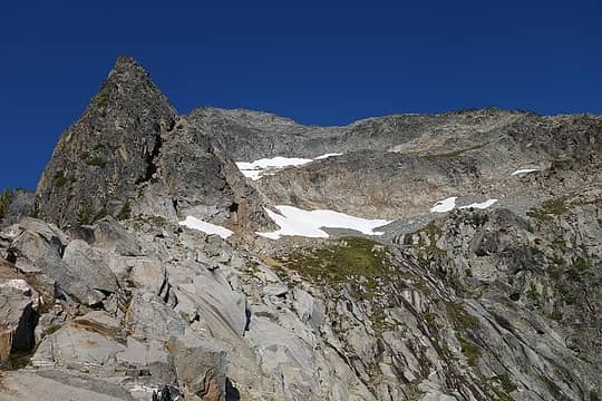 This was taken from the notch in the east ridge. From here, we headed up the rocky terrain in the lower left of the photo until we could gain the heather benches in the lower-middle of the photo, below the prominent snow patch. From here we traversed up and right, then climbed the path of least resistance up blocky and exposed class 3 until we gained Copper's NE ridge (we gained the NE ridge on the upper right side of this photo).