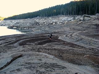 Mike hiking across the exposed lakebed