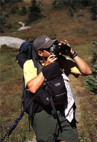 photographer with LowePro chest harness system