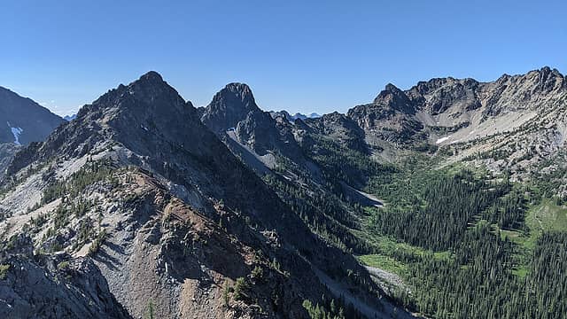 From the summit: Johnson's Jonah, Black Tower (what a striking peak!), Wy'East.