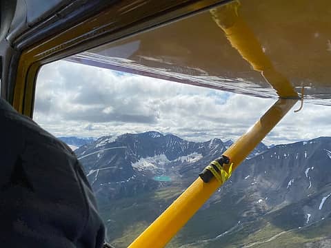 Flying in.  Unnamed peaks, lakes, and glaciers.  That's how you deal with bear spray..